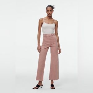 Zara High-waisted jeans with back patch pockets. Unfinished hem